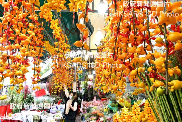 Hong Kong takes on a festive atmosphere with colourful Lunar New Year decorations and traditional feasts.
