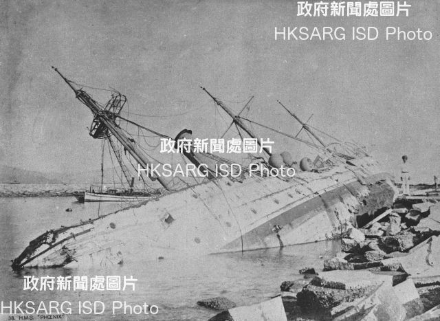 H.M.S. Phoenix wrecked after typhoon. This photo was copied in 1962.